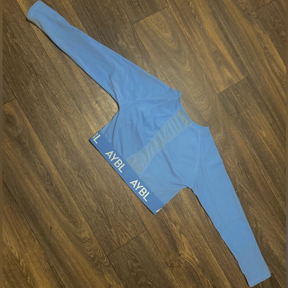 Aybl cropped athletic long sleeve powder blue top lightly used